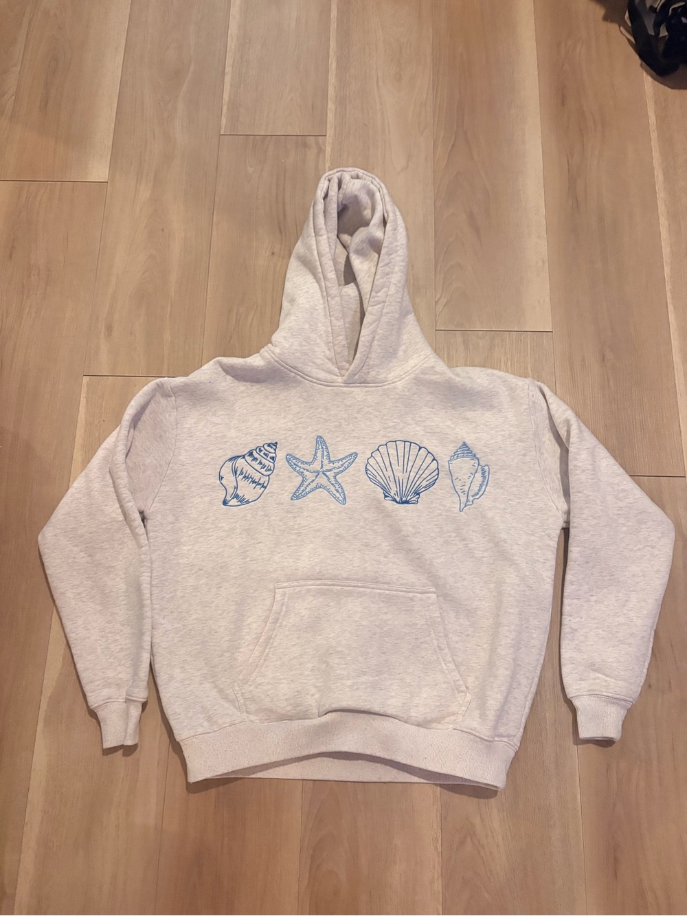 Prisana Bay Light Gray Hoodie with Blue Embroidered Seashell Graphic